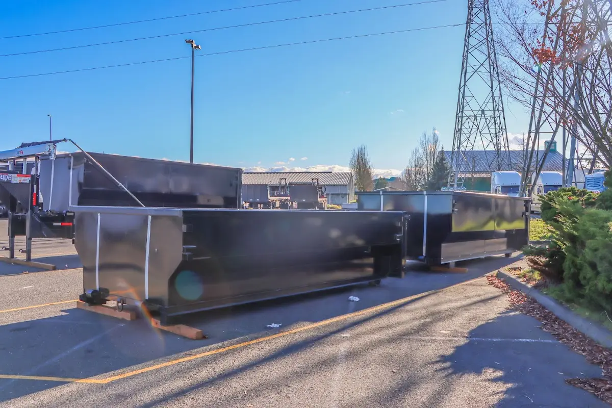 Roll-off dumpster ready for waste disposal at job site for Concrete Dumpster Rental in Bridgeport